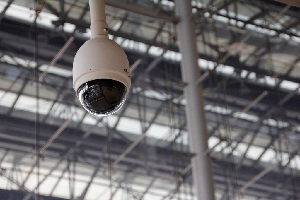CCTV camera hanging from a roof
